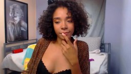 Sexy teen black curly kitten Marie Cline with a cute smile