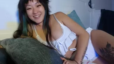 Fun petite tattooed Asian goddess squirts her wet hairy pussy